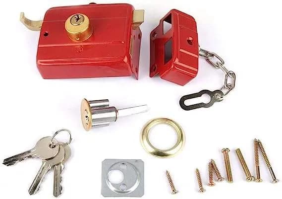 Red rim lock with brass cylinder, keys, strike and fittings
