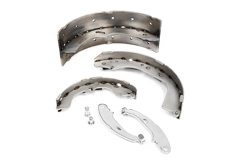 Unlined brake shoe cores and metal disc brake pad backing plates