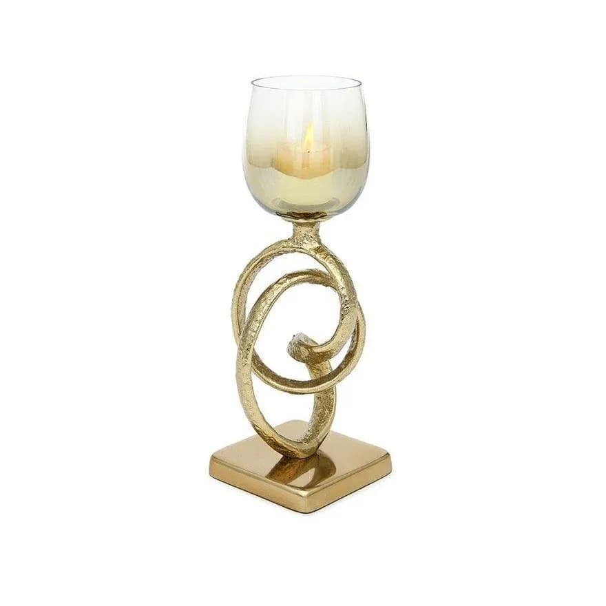 Gold-tone metal candle holder with a tinted glass hurricane shade
