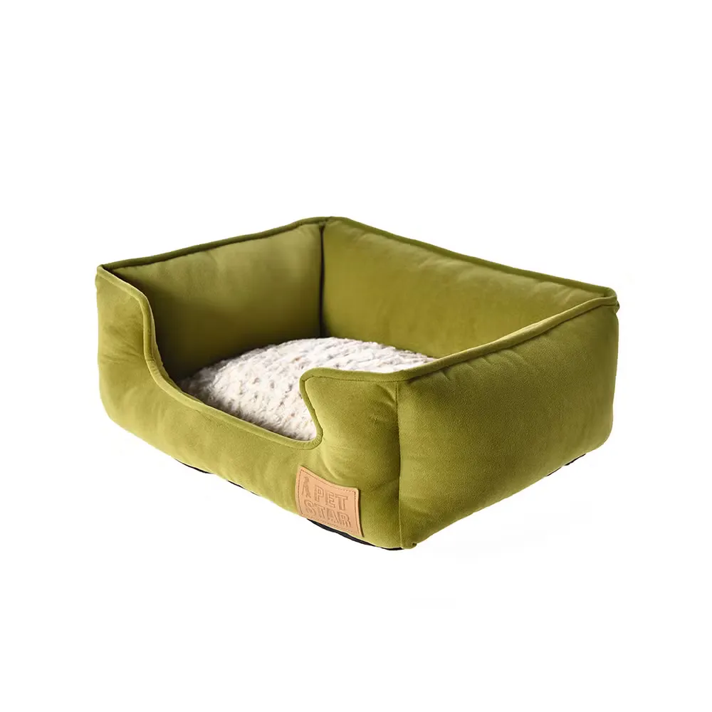 Olive green bolster pet bed with a cushion on a white background