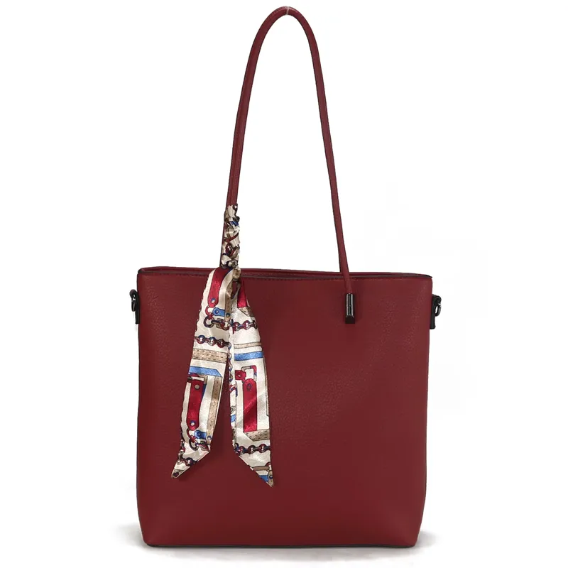 Burgundy PU tote bag with a patterned scarf on the handle